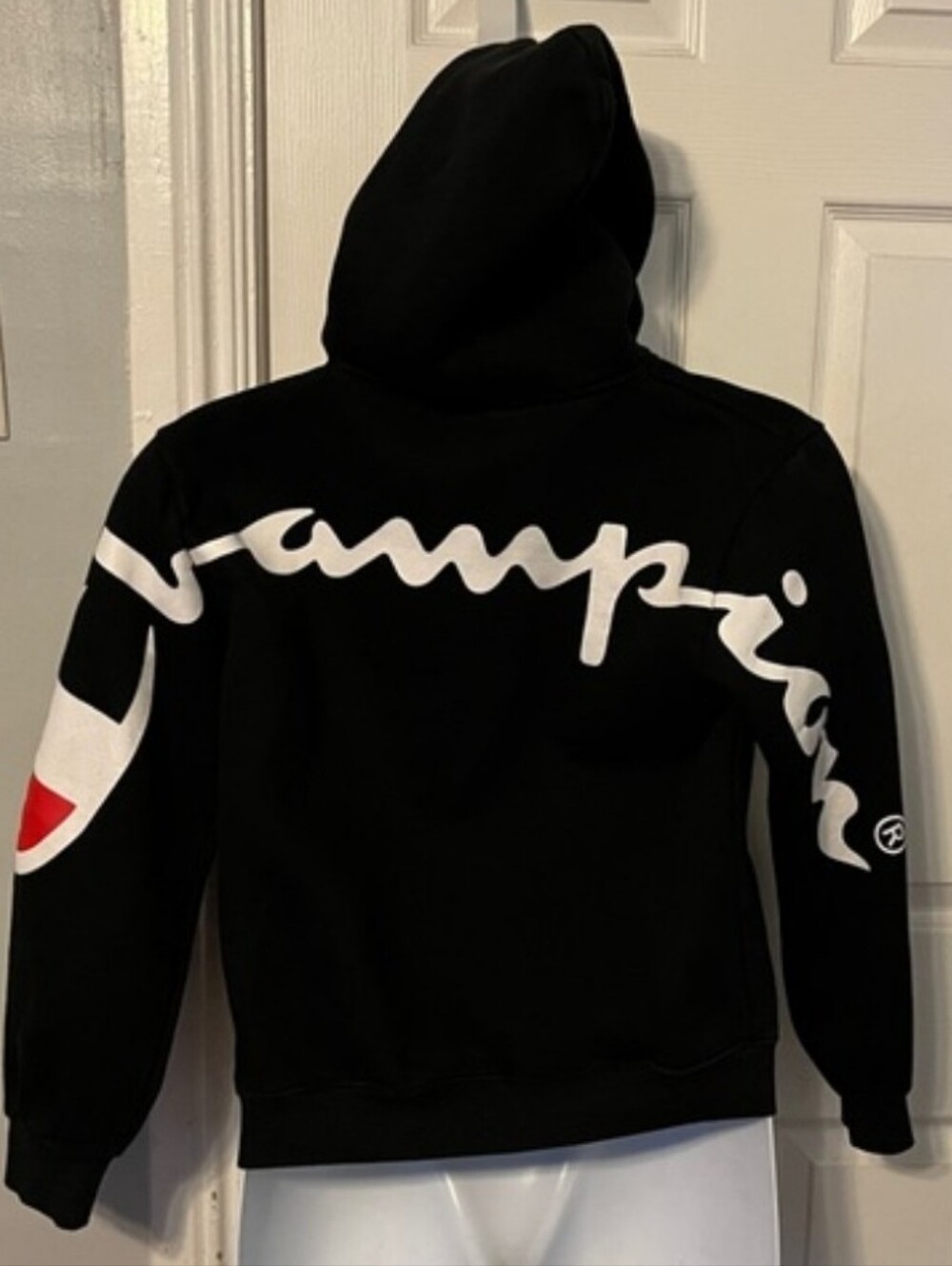 Vintage Champion Black Hoodie with Red & White Sleeve Emblem